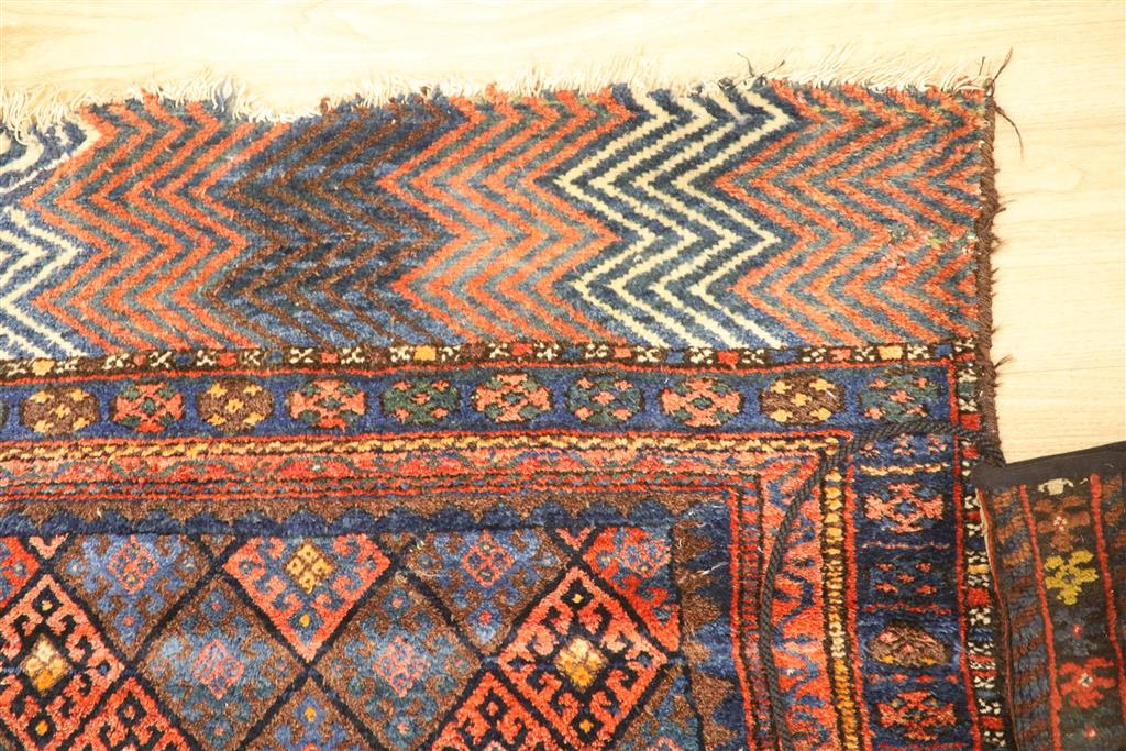 A Turkoman saddle rug, 104 x 82cm and a small carpet bag